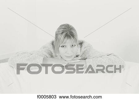 Stock Image - inside, indoors, woman, women, portrait, portraits. Fotosearch