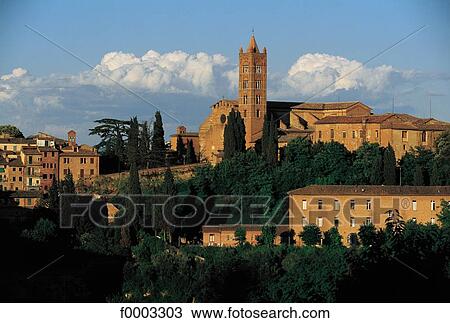 Stock Image - Italy, traditional dwelling, Christian architecture, village, house, cathedral, church. Fotosearch