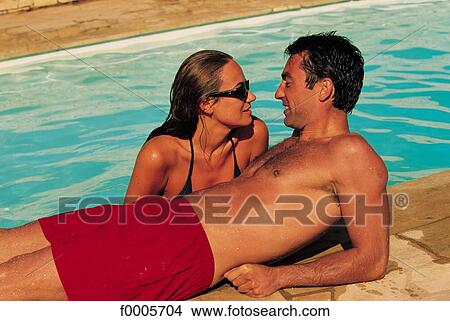 men, woman, women, swimming costume, tenderness, affection View Large Photo Image Picture - men, woman, women, swimming costume, tenderness, affection. Fotosearch