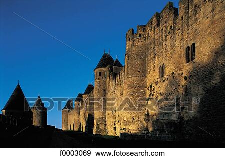 Stock Photo - night, mediaeval city, medieval city, castle, rampart, fortification, fortified castle. Fotosearch
