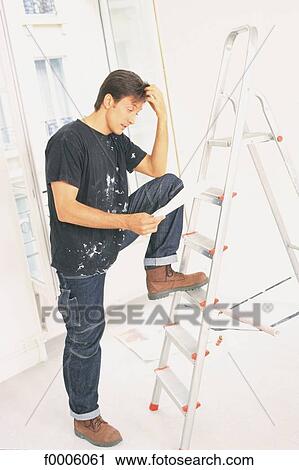 Stock Image - odd jobs, men, people, inside, indoors. Fotosearch
