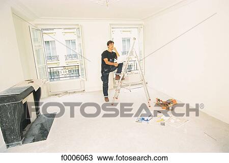 Stock Image - odd jobs, men, people, inside, indoors. Fotosearch