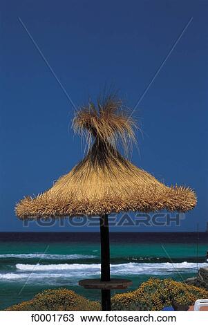 Stock Image - parasol, beach, beaches, sea, sand, landscape, landscapes. Fotosearch