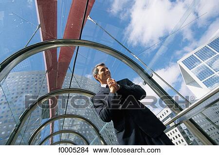 Picture - people, businessman, business man, business men, businessmen, victory, success. Fotosearch