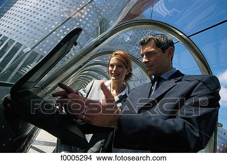 Picture - people, businessman, business man, business men, businessmen, men. Fotosearch