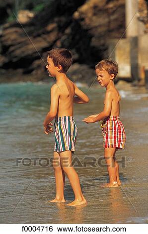Stock Photograph - people, child, children, boy, sea, vacation, holidays. Fotosearch