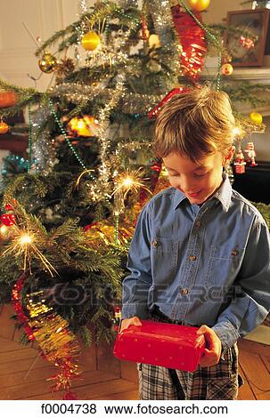 people, child, children, boy, Christmas, Xmas, Christmas tree View Large Photo Image Stock Photo - people, child, children, boy, Christmas, Xmas, Christmas tree. Fotosearch