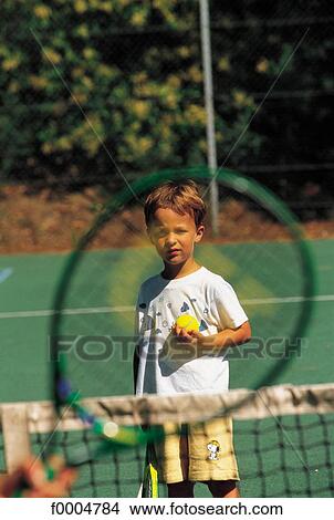Picture - people, child, children, boy, tennis, tennis court, tennis racket. Fotosearch