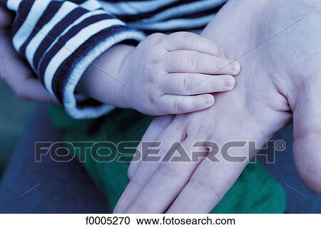 Stock Image - people, family, baby, tenderness, affection, tender, tenderly. Fotosearch