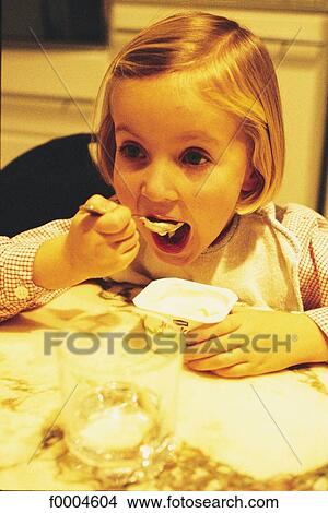 people, inside, indoors, child, children, girl, meal View Large Photo Image Picture - people, inside, indoors, child, children, girl, meal. Fotosearch