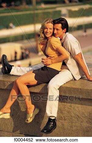 Stock Image - people, men, stroll, strolling, smile, smiling. Fotosearch