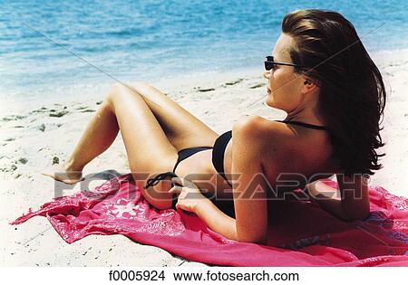 people, swimming costume, vacation, holidays, woman, women View Large Photo Image Picture - people, swimming costume, vacation, holidays, woman, women. Fotosearch