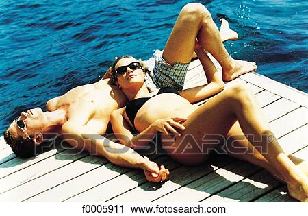 Stock Image - people, swimming costume, vacation, holidays, woman, women. Fotosearch