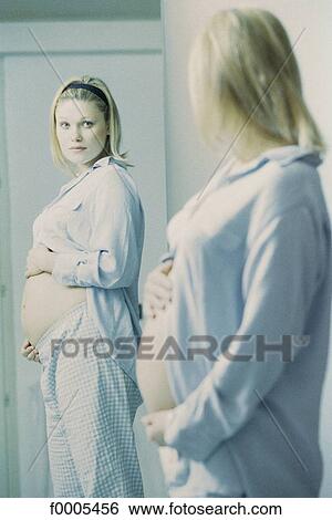 people, woman, women, belly, look, mirror View Large Photo Image Stock Photograph - people, woman, women, belly, look, mirror. Fotosearch