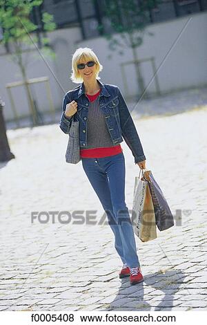 Stock Photo - people, woman, women, blond hair, blond-haired, blonde. Fotosearch