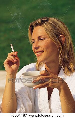 people, woman, women, cup of coffee, cigarette, robe View Large Photo Image Stock Photo - people, woman, women, cup of coffee, cigarette, robe. Fotosearch