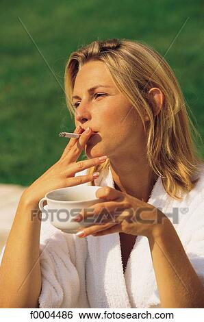 people, woman, women, cup of coffee, cigarette, robe View Large Photo Image Stock Photograph - people, woman, women, cup of coffee, cigarette, robe. Fotosearch