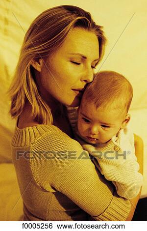 Stock Photograph - people, woman, women, family, baby, tenderness, affection. Fotosearch