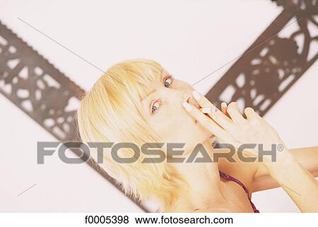 Stock Photo - people, woman, women, inside, indoors, blond hair. Fotosearch