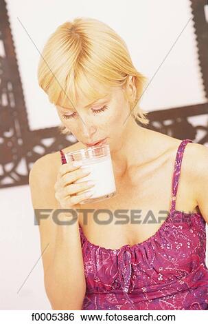 Stock Photograph - people, woman, women, inside, indoors, blond hair. Fotosearch