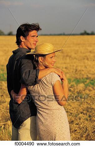 people, woman, women, men, couple, field View Large Photo Image Stock Image - people, woman, women, men, couple, field. Fotosearch