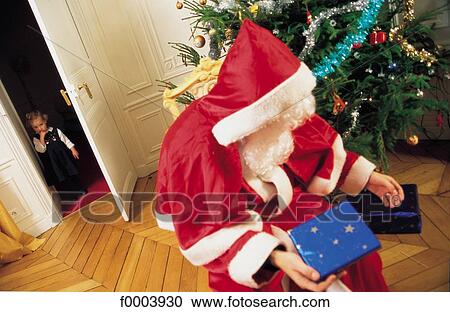 Santa Claus, celebration, gift, offer, present, tradition, Christmas View Large Photo Image Stock Image - Santa Claus, celebration, gift, offer, present, tradition, Christmas. Fotosearch