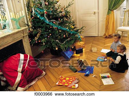 Santa Claus, Christmas, Xmas, child, children, girl, boy View Large Photo Image Stock Photograph - Santa Claus, Christmas, Xmas, child, children, girl, boy. Fotosearch
