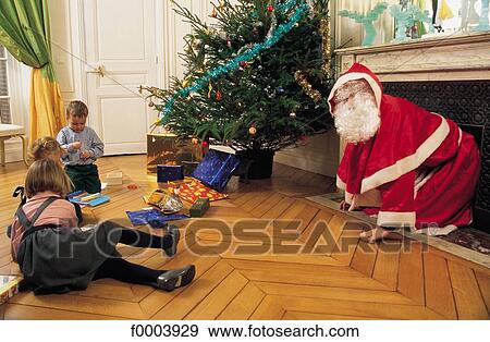 Santa Claus, Christmas, Xmas, celebration, tradition, people, child View Large Photo Image Stock Photo - Santa Claus, Christmas, Xmas, celebration, tradition, people, child. Fotosearch