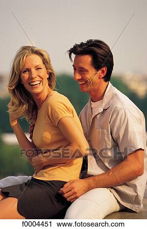 sitting, exterior, open air, men, smile, smiling View Large Photo Image Stock Image - sitting, exterior, open air, men, smile, smiling. Fotosearch