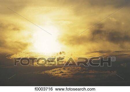 sky, cloud, cloudy, clouds, sun, sunset, setting sun View Large Photo Image Stock Photograph - sky, cloud, cloudy, clouds, sun, sunset, setting sun. Fotosearch
