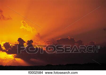 sunset, setting sun, cloud, cloudy, clouds, sky View Large Photo Image Picture - sunset, setting sun, cloud, cloudy, clouds, sky. Fotosearch