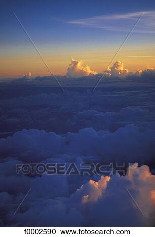 sunset, setting sun, cloud, cloudy, clouds, sky View Large Photo Image Stock Image - sunset, setting sun, cloud, cloudy, clouds, sky. Fotosearch