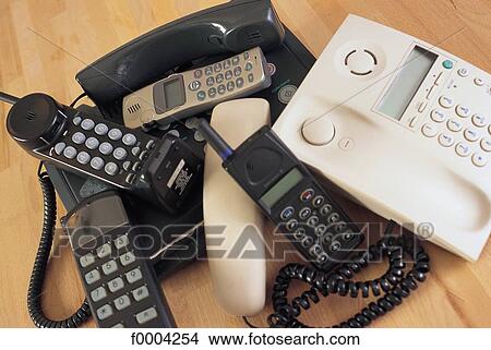 telecommunication, telephone, mobile phone, cell phone, cellphone, cellular phone, fixed phone View Large Photo Image Picture - telecommunication, telephone, mobile phone, cell phone, cellphone, cellular phone, fixed phone. Fotosearch