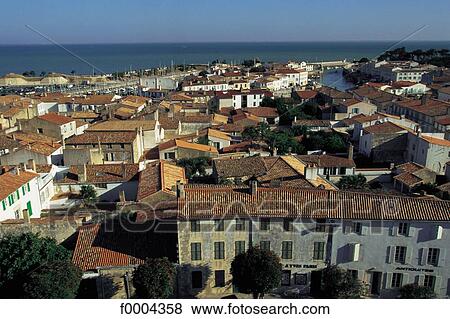 Stock Photo - town, city, roof, general view, dwelling, traditional dwelling, Charente Maritime. Fotosearch