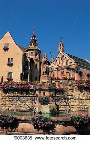 traditional dwelling, house, Christian architecture, statue, fountain, church, Alsace View Large Photo Image Stock Photography - traditional dwelling, house, Christian architecture, statue, fountain, church, Alsace. Fotosearch