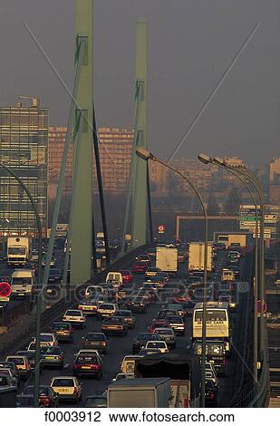Stock Image - traffic jam, car, bridge, going out of work, highway, road, France. Fotosearch