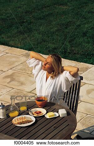 woman, women, breakfast, bowl of coffee, orange juice, toast, robe View Large Photo Image Stock Photography - woman, women, breakfast, bowl of coffee, orange juice, toast, robe. Fotosearch