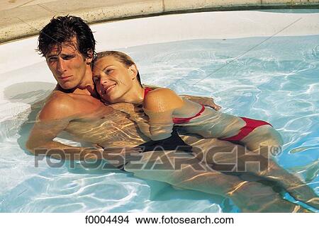 woman, women, couple, men, swimming pool View Large Photo Image Picture - woman, women, couple, men, swimming pool. Fotosearch