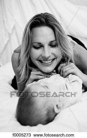 woman, women, family, people, baby, tenderness, affection View Large Photo Image Stock Image - woman, women, family, people, baby, tenderness, affection. Fotosearch