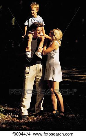 woman, women, men, family, father, daddy View Large Photo Image Picture - woman, women, men, family, father, daddy. Fotosearch