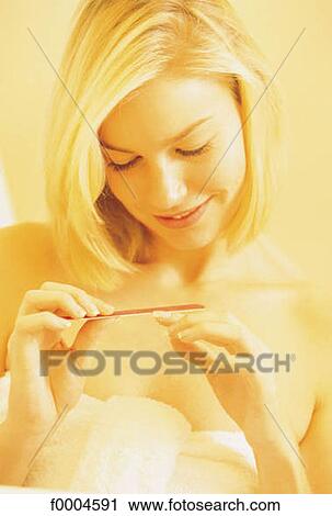 woman, women, people, beauty, manucure, nail file, blond hair View Large Photo Image Stock Image - woman, women, people, beauty, manucure, nail file, blond hair. Fotosearch