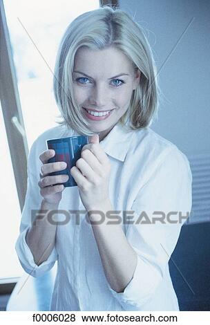 Stock Photo - woman, women, people, blond hair, blond-haired, blonde, fair hair. Fotosearch