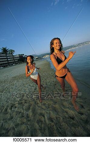 woman, women, people, dark hair, dark-haired, swimming costume View Large Photo Image Stock Image - woman, women, people, dark hair, dark-haired, swimming costume. Fotosearch
