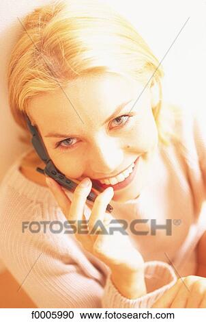 Stock Image - woman, women, people, inside, indoors, blond hair. Fotosearch