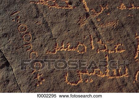 Stock Photography - writing, write, Cave art, Cave painting, Libya, Northern Africa, archeological site. Fotosearch