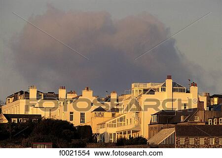 Channel Islands, Guernsey, city house and stormy sky View Large Photo Image Picture - Channel Islands, Guernsey, city house and stormy sky. Fotosearch