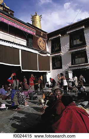 Stock Photography - China, Tibet, Lhasa, Jokhang Monastery, faithful at prayer. Fotosearch
