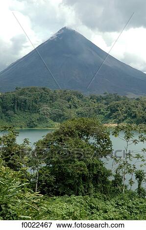 Costa Rica, Arenal Volcano National Park, volcano and lake View Large Photo Image Stock Photo - Costa Rica, Arenal Volcano National Park, volcano and lake. Fotosearch