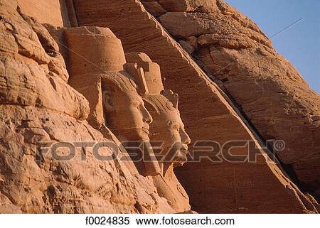 Egypt, Abu Simbel, temple of Ramesses II, statues of Ramesses in profile View Large Photo Image Stock Photography - Egypt, Abu Simbel, temple of Ramesses II, statues of Ramesses in profile. Fotosearch