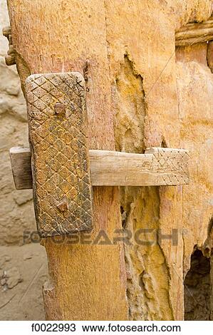 Stock Image - Egypt, Libyan desert, Siwa Oasis, Aghurmi, traditional door, lock. Fotosearch